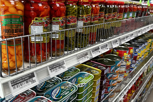 Shelves of jarred preserves and canned goods at Brazmarket